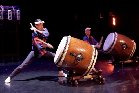 Image of two men playing Taikoza drums.