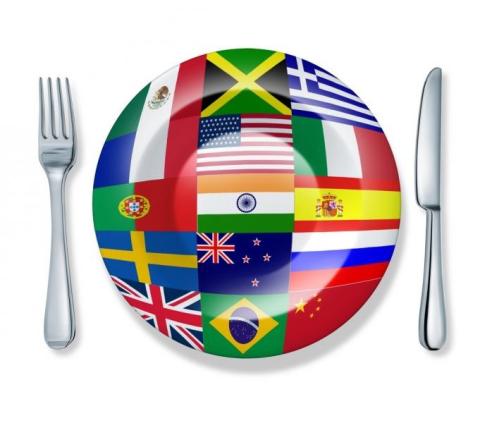Image of a sphere fork, plate, and knife, but the plate is covered in country flags.
