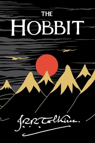 The Hobbit over featuring black mountains with yellow-brown mountaintops and a red sun in the back, and two yellow-brown birds flying in the foreground.