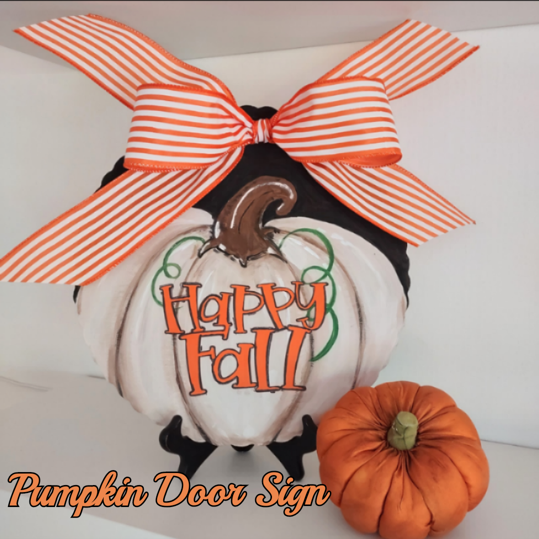 Image of the craft featuring a White pumpkin with an orange bow and the words happy fall written on the pumpkin. 