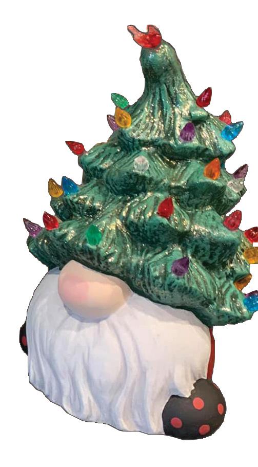 Image of the craft featuring a ceramic gnome painted with his hat looking like a Christmas Tree. 