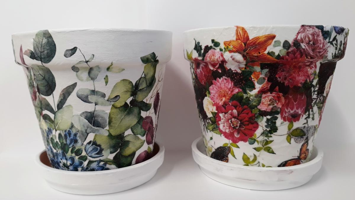 Image of the craft featuring a flower pot painted with decoupaged flowers