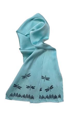 Image of the craft featuring a light blue scarf with imprinted Dragonflies. 