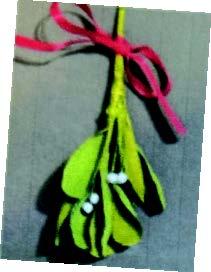 Image of the craft featuring a stem of Mistletoe made from crepe paper. 